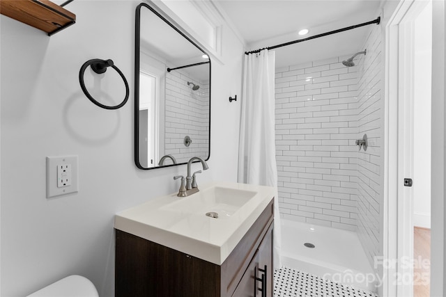 bathroom with vanity and walk in shower