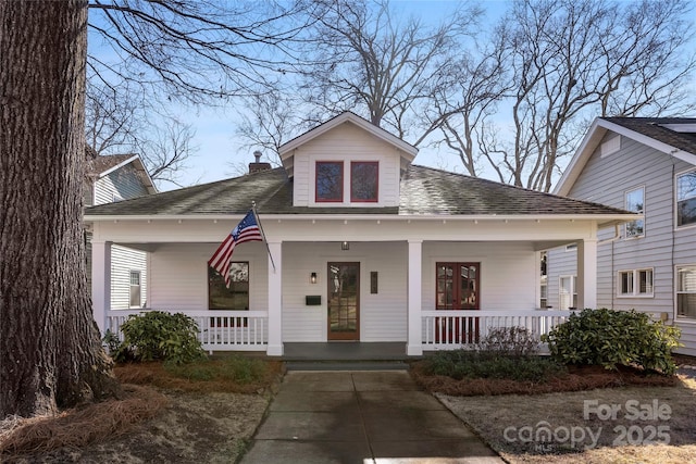 bungalow-style home with a porch