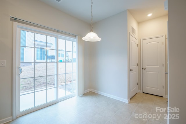 view of unfurnished dining area