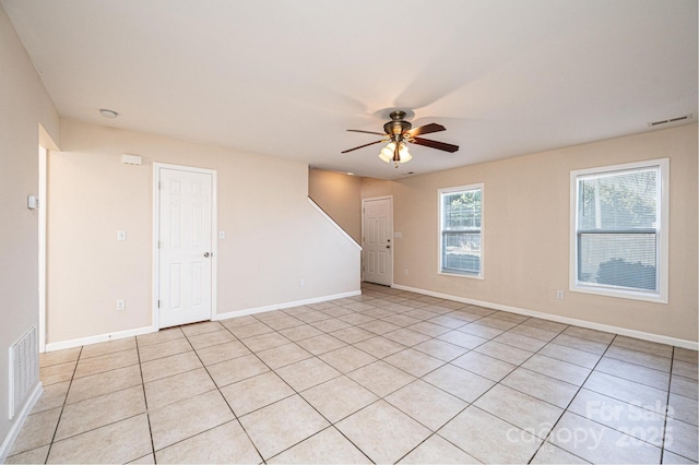 unfurnished room featuring ceiling fan