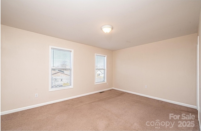 view of carpeted spare room