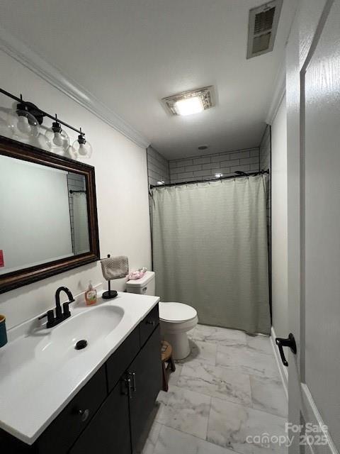 bathroom featuring vanity, crown molding, a shower with curtain, and toilet