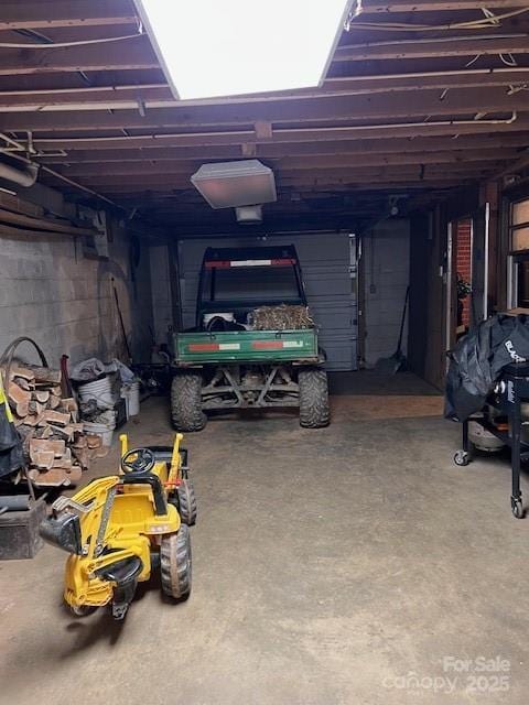 garage featuring a carport