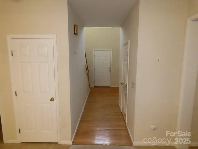 hall with light wood-type flooring