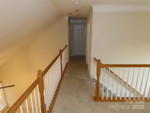 hall featuring vaulted ceiling