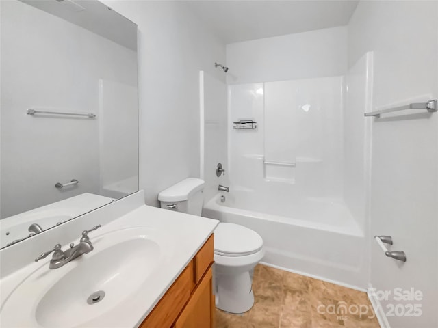 full bathroom featuring vanity, tub / shower combination, and toilet