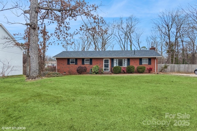 ranch-style home featuring a front yard