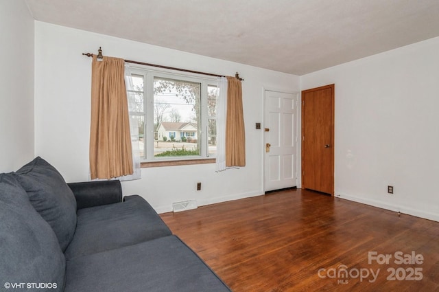 living room with dark wood-type flooring