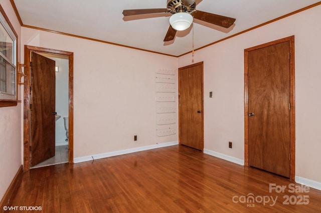 unfurnished bedroom with hardwood / wood-style floors and crown molding