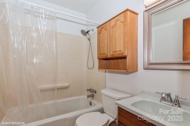 full bathroom featuring vanity, shower / bathtub combination with curtain, and toilet