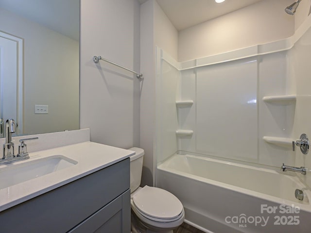 full bathroom with toilet, vanity, and bathtub / shower combination