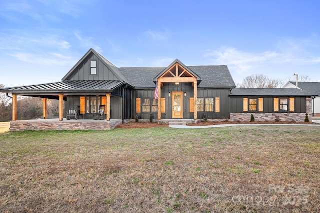 modern farmhouse with a front lawn