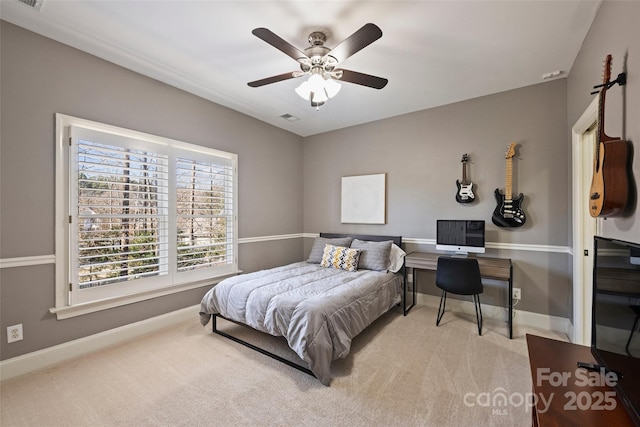 bedroom with light colored carpet and ceiling fan