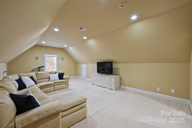 living room with vaulted ceiling and light colored carpet