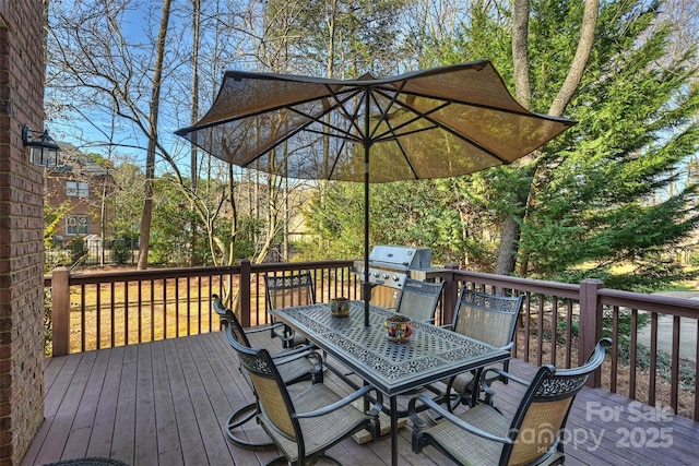 wooden terrace with area for grilling