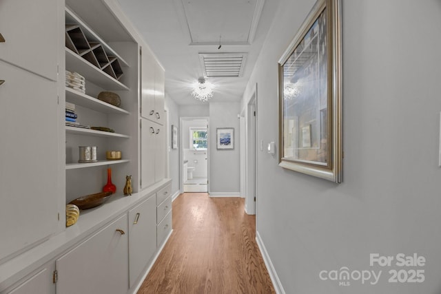 hallway featuring light hardwood / wood-style flooring