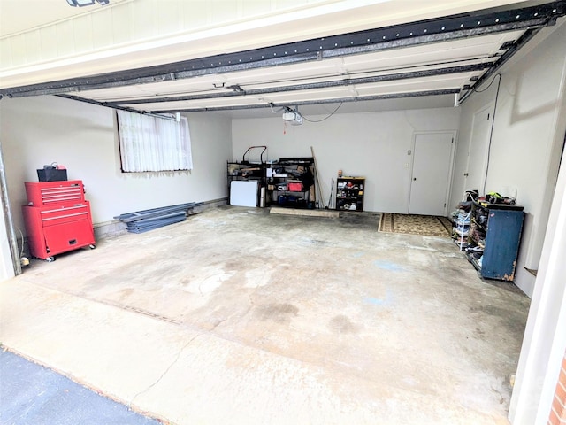 garage featuring a garage door opener