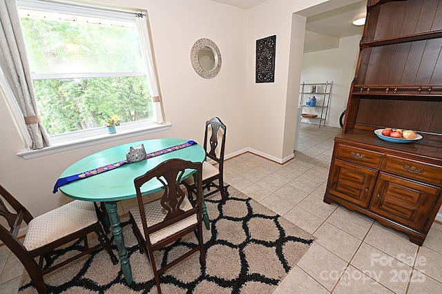 dining room with light tile patterned floors