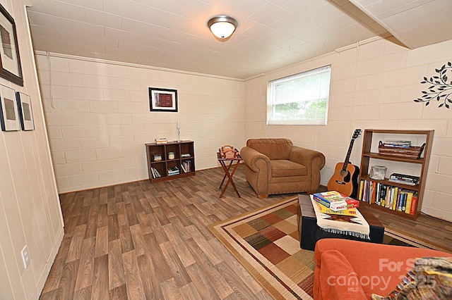 living area with wood-type flooring