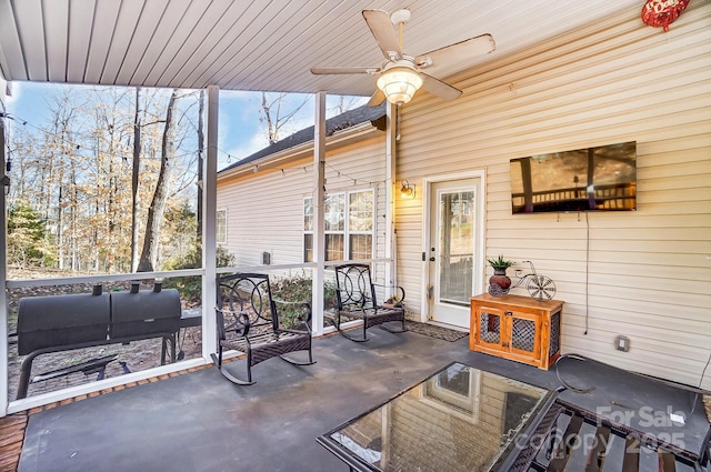 view of patio / terrace with ceiling fan and outdoor lounge area