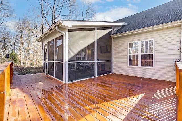 wooden terrace with a sunroom