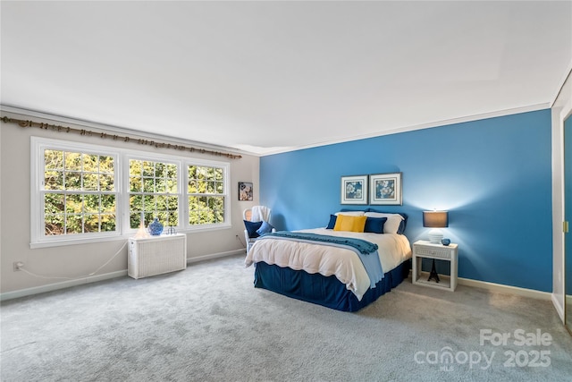 carpeted bedroom featuring crown molding, radiator heating unit, and baseboards