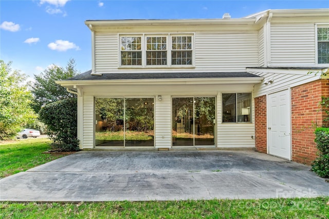 rear view of house featuring a patio area