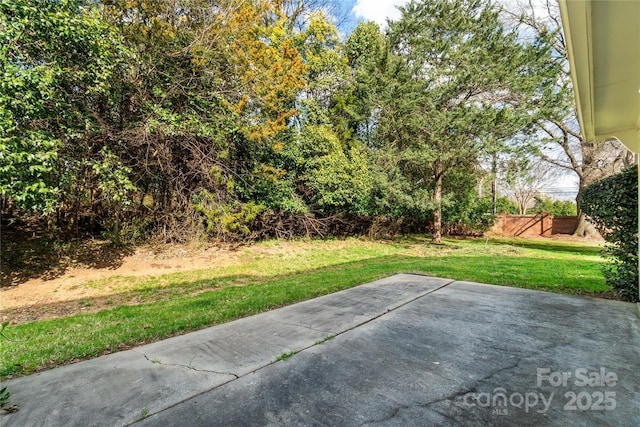 view of patio with fence