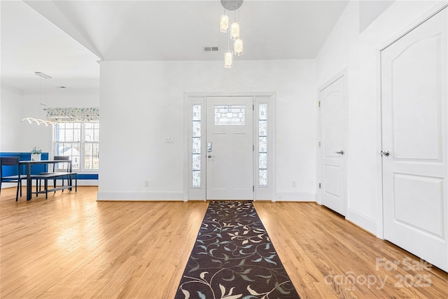 foyer entrance featuring light hardwood / wood-style floors