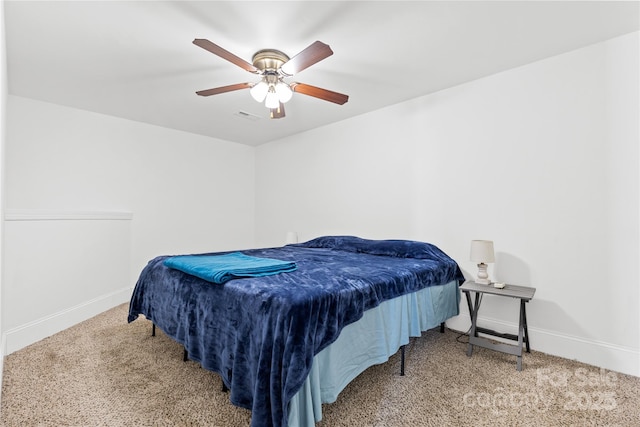 bedroom featuring ceiling fan and carpet floors