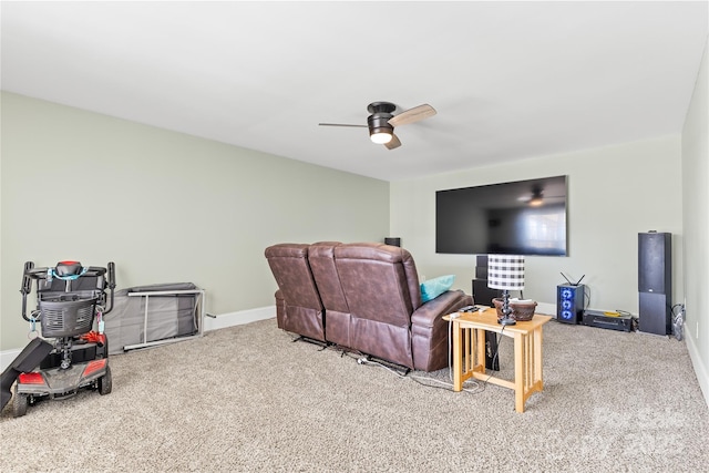 living room featuring carpet floors and ceiling fan