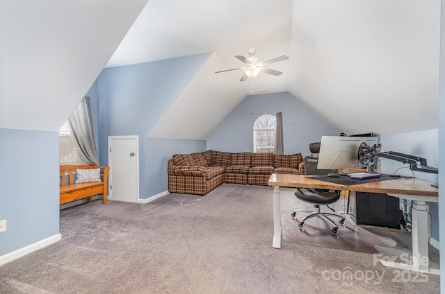 office space with vaulted ceiling, light carpet, and ceiling fan