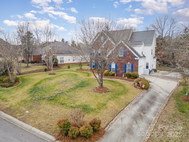 view of front of home with a front lawn