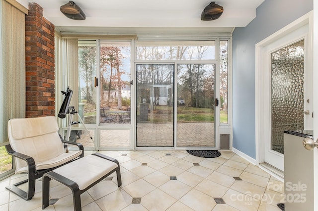 doorway featuring light tile patterned floors