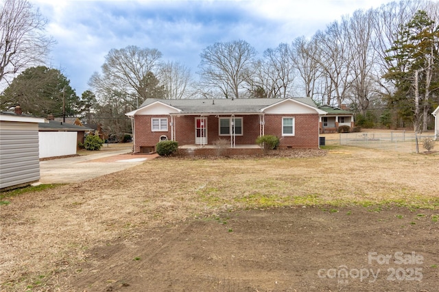 single story home featuring a front yard