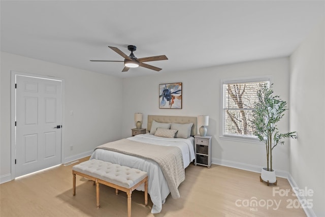 bedroom featuring ceiling fan and light wood-type flooring