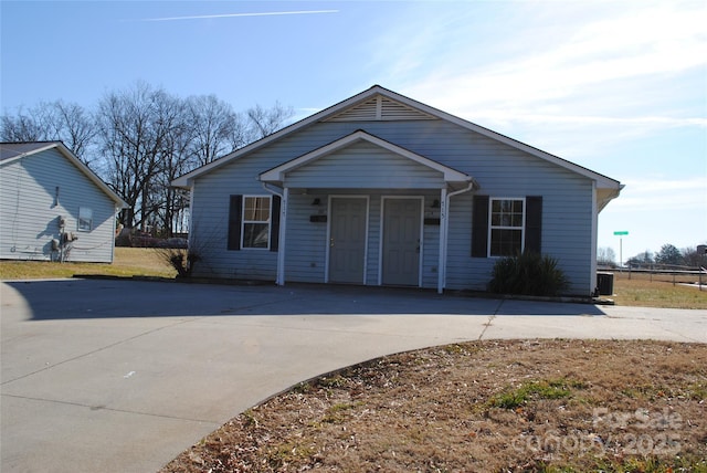 view of front of house with central air condition unit