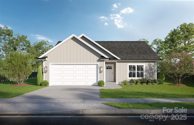 view of front facade with a front yard and a garage