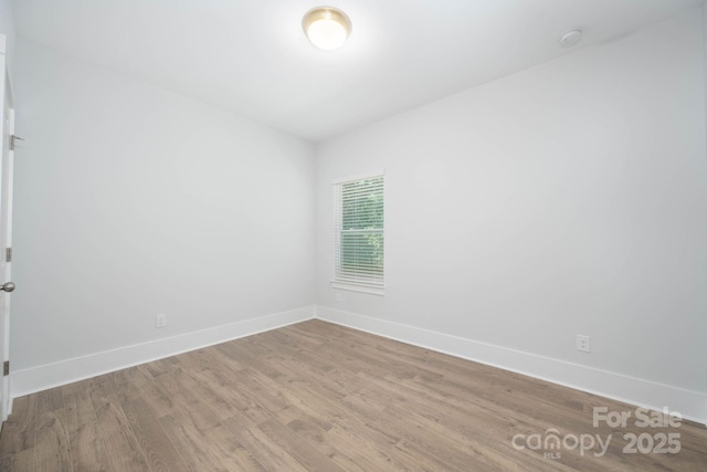 empty room with light wood-type flooring