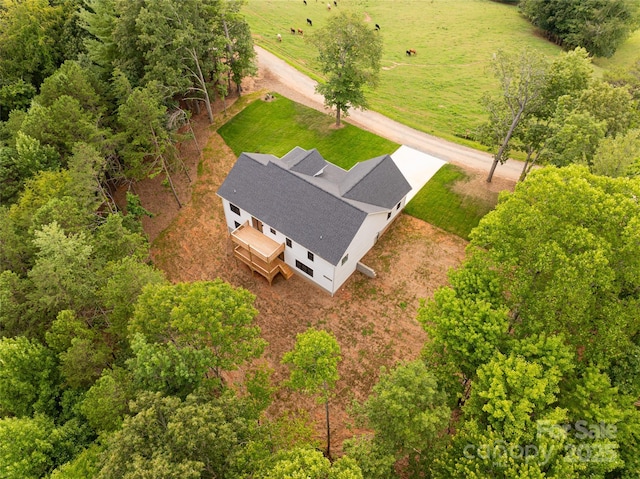 birds eye view of property with a rural view