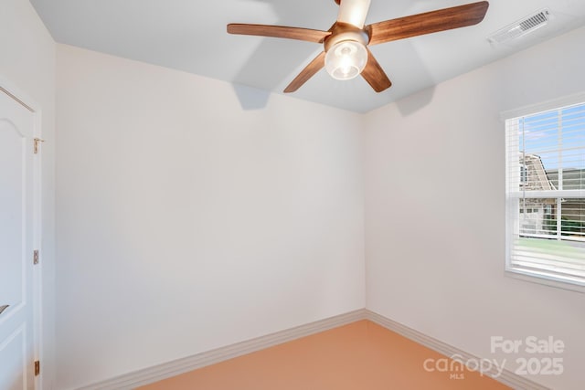 empty room featuring ceiling fan