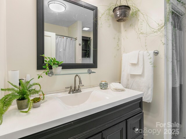 full bath featuring vanity