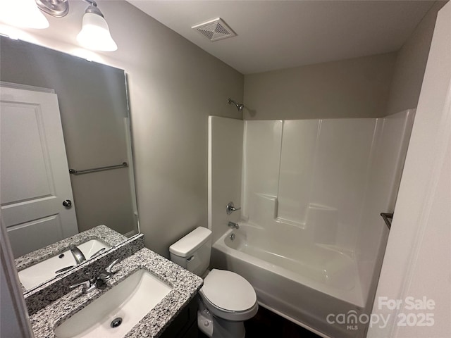 full bathroom featuring vanity, toilet, and shower / bathing tub combination