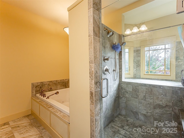 bathroom with independent shower and bath