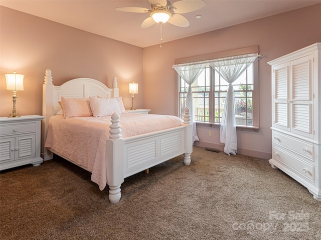 carpeted bedroom with ceiling fan