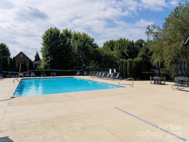 view of pool with a patio area