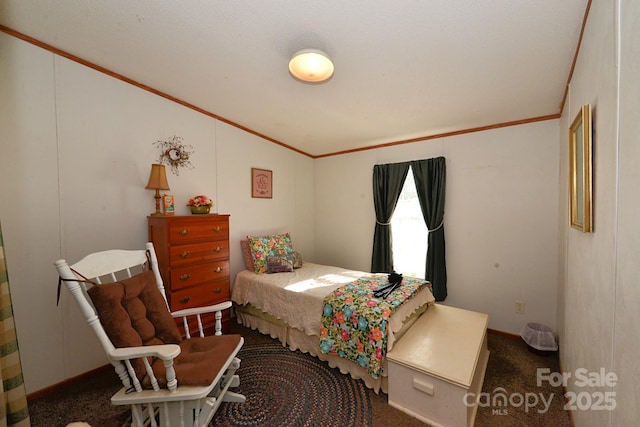 carpeted bedroom featuring vaulted ceiling and crown molding