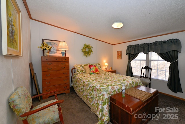 bedroom featuring ornamental molding, carpet floors, and a textured ceiling