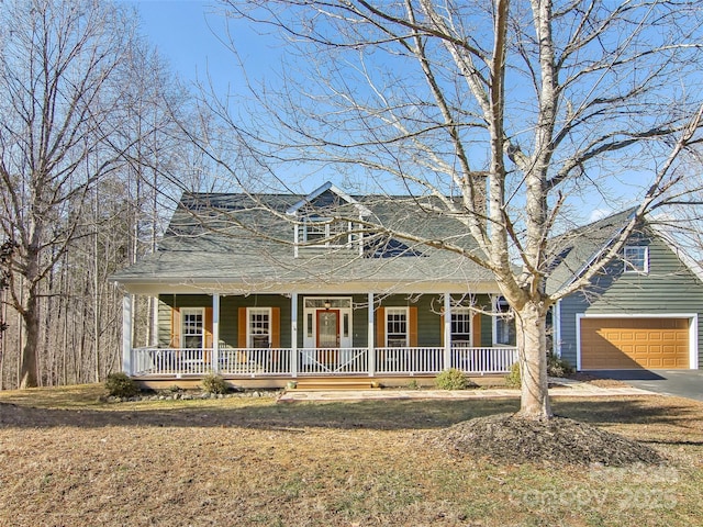 view of front facade featuring a garage and a porch