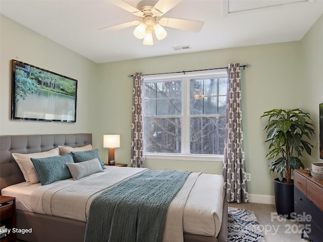 carpeted bedroom with ceiling fan